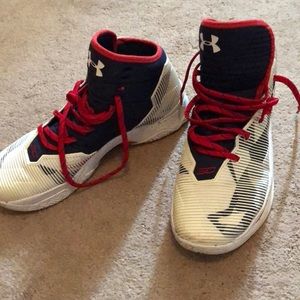 read white and blue sneakers